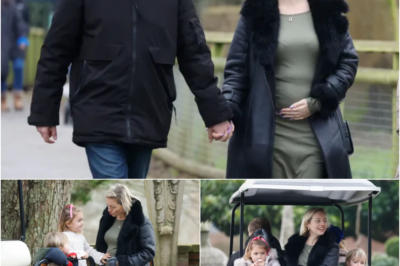 HEARTWARMING MOMENT – Tom Parker’s pregnant widow, Kelsey, proudly showcases her growing baby bump during a family trip to the zoo with her new partner. But the moment that truly stole hearts was when her young son lovingly kissed her belly, creating a scene of pure emotion that left fans in awe.