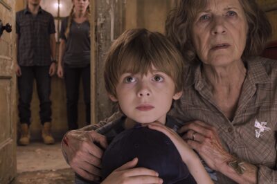 My 7-year-old grandson called me in the middle of the night, sobbing, “Grandma, I’m so hungry, he locked the door so I can’t get out and Mom won’t wake up!” I rushed to their house and knocked but no one answered. I finally climbed in through a window—and what I saw in the living room told me this was no longer just a family matter.